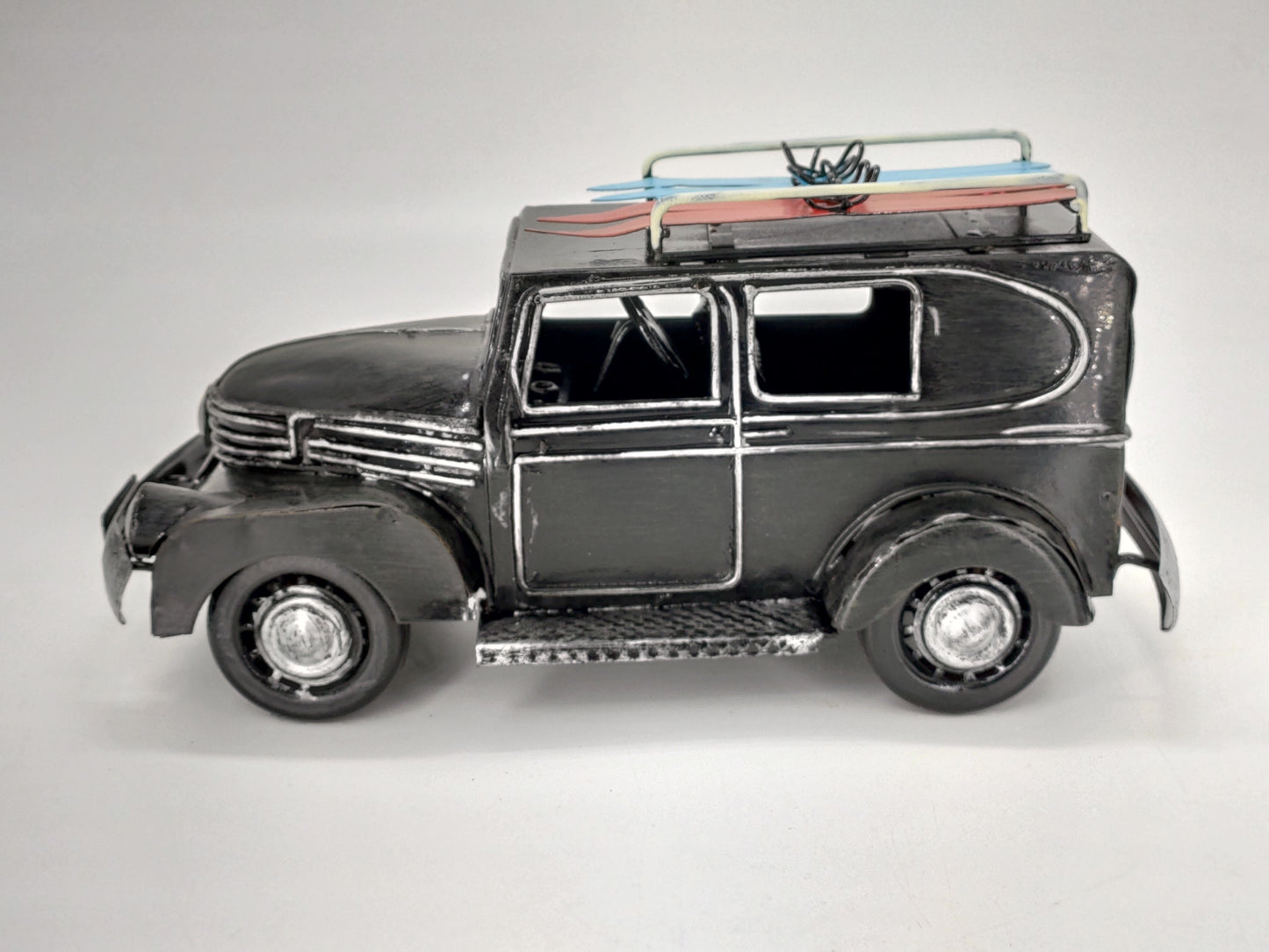 BLACK VINTAGE CAR WITH SURFBOARDS DIECAST MODEL