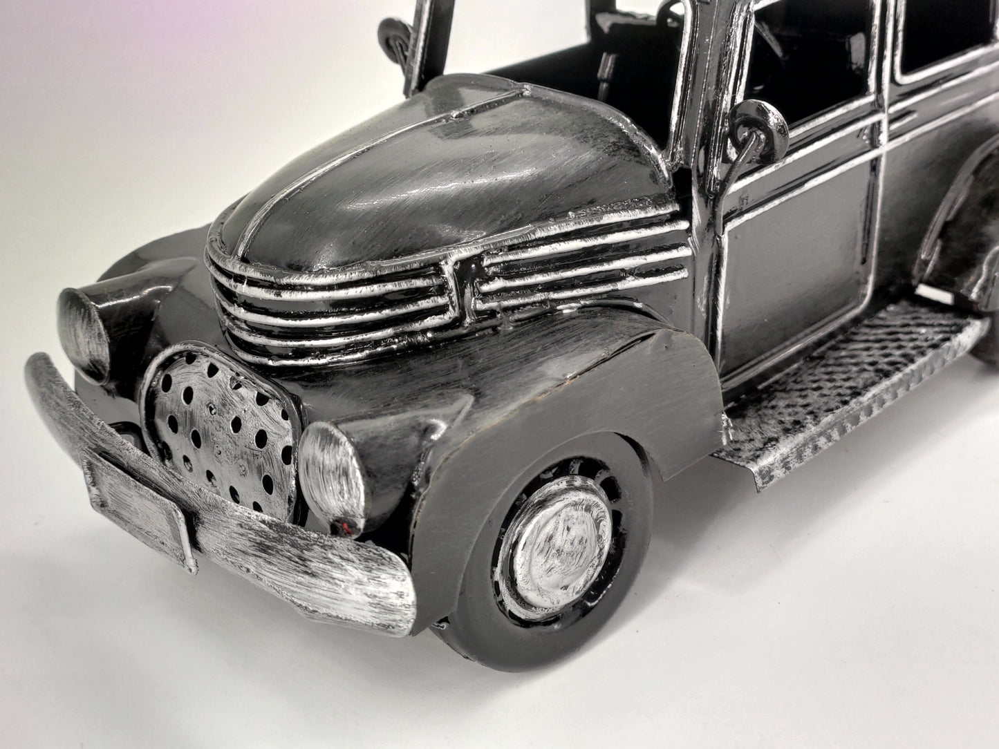 BLACK VINTAGE CAR WITH SURFBOARDS DIECAST MODEL